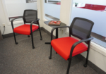 Comfortable guest seating in private office