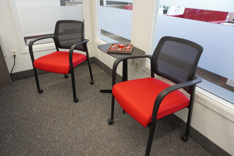 Comfortable guest seating in private office