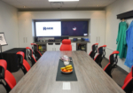 fully custom board room design with custom built in bar and storage