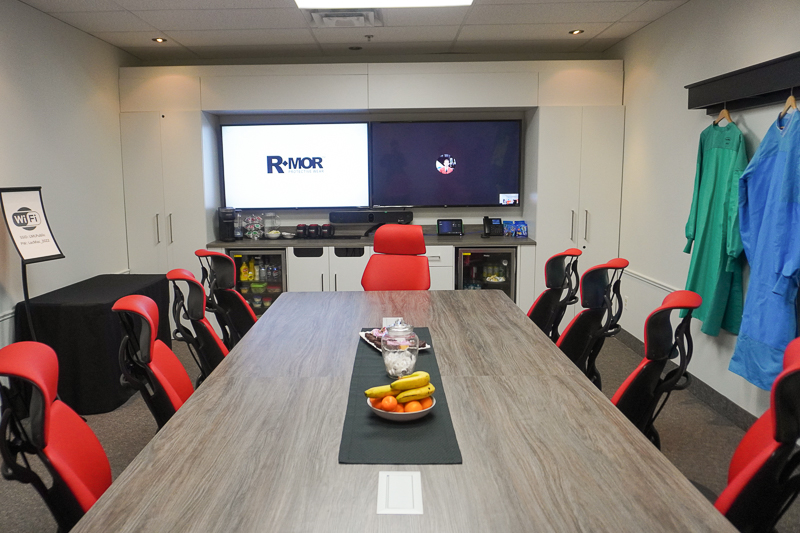 fully custom board room design with custom built in bar and storage